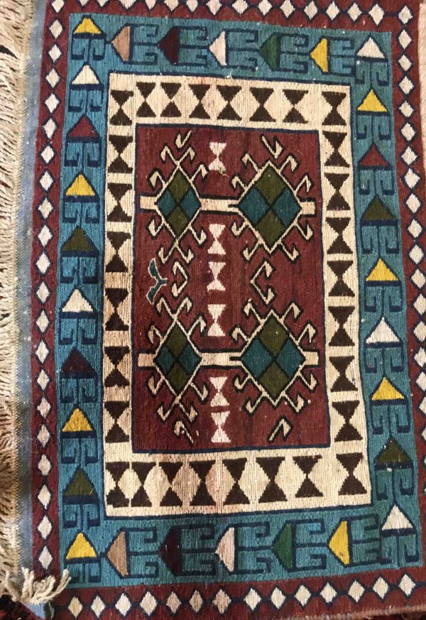 a blue nomadic rug