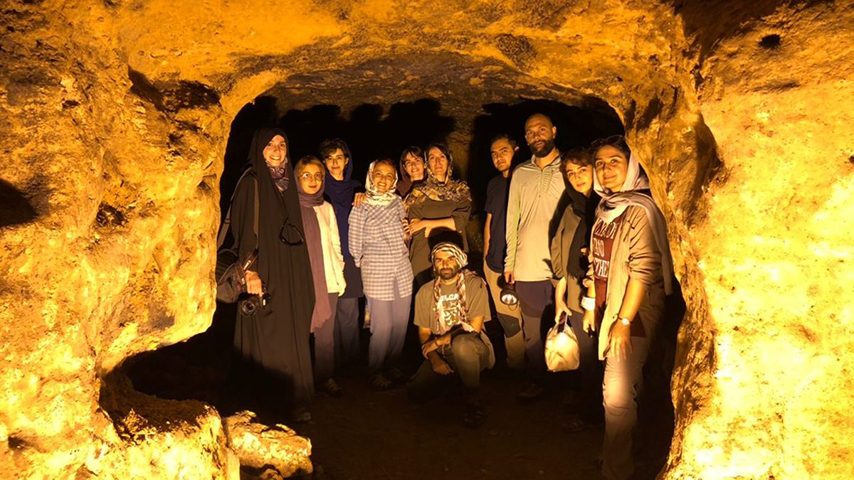 A group of travelers in a cave in a nomadic trip